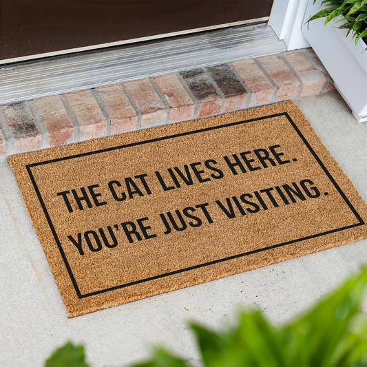 The Cat Lives Here You’re Just Visiting Doormat, Funny Cat Welcome Mat, Cat Lover Gift, Cat Owner Door Mat, Housewarming Front Door Decor