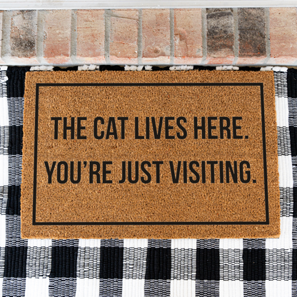 The Cat Lives Here You’re Just Visiting Doormat, Funny Cat Welcome Mat, Cat Lover Gift, Cat Owner Door Mat, Housewarming Front Door Decor